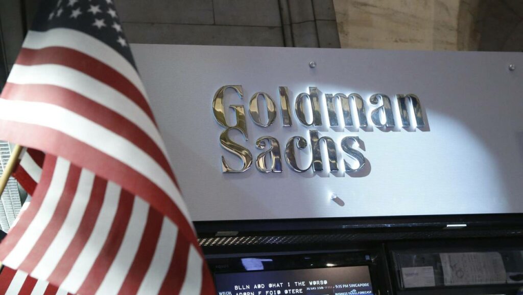 Goldman Sachs stall on the floor of the New York Stock Exchange is shown in this July 16, 2013 file photo. Goldman Sachs Group Inc reported a 50 percent jump in quarterly profit as last month's pickup in bond market activity helped to boost trading revenue, showing that banks sticking with the notoriously volatile business can reap big rewards. REUTERS/Brendan McDermid/Files (UNITED STATES - Tags: BUSINESS)